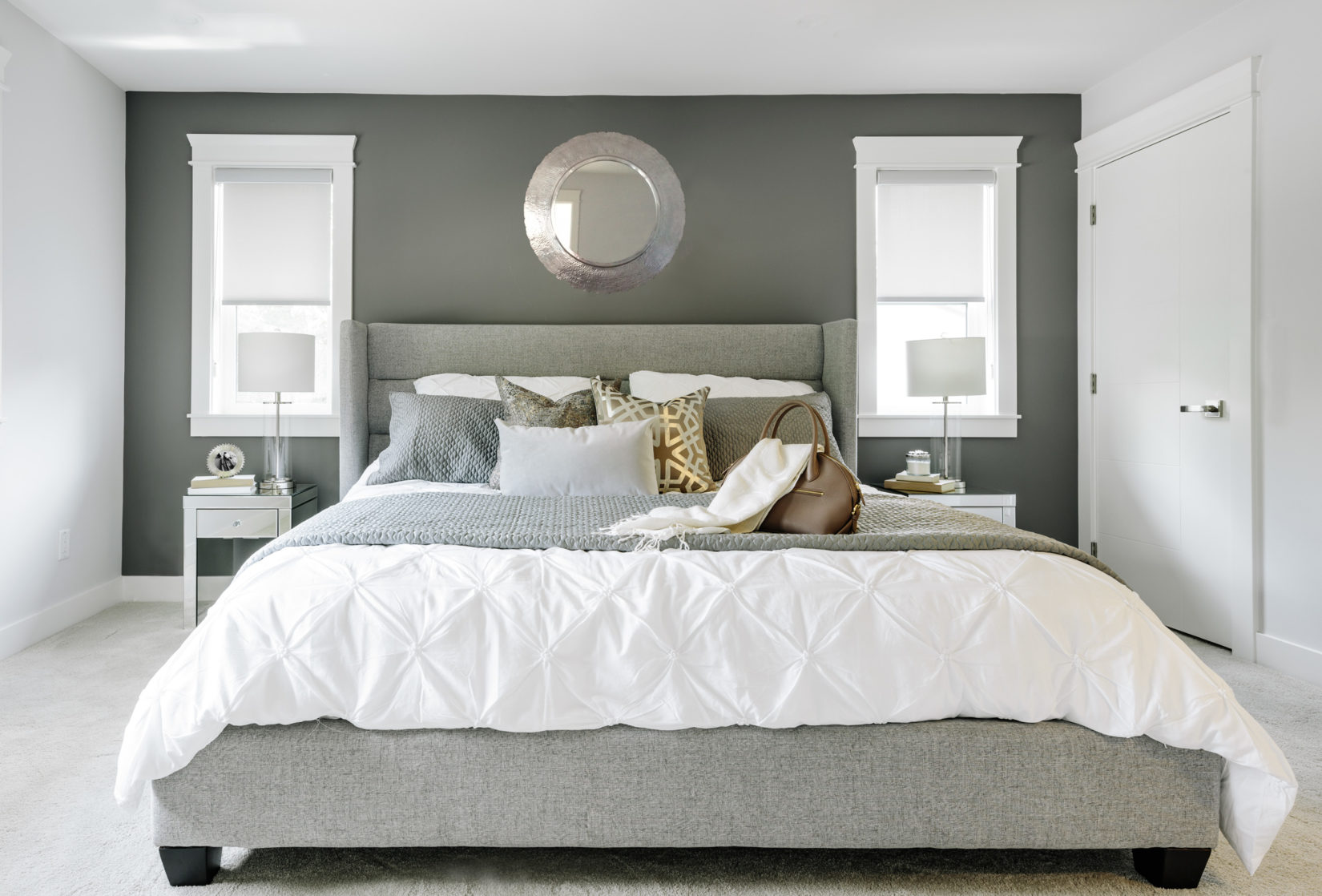 Alexandra Interiors luxurious contemporary master bedroom with linen tufted headboard. Interior design Vancouver